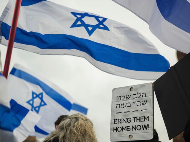 'Bring them home' poster removed at Israeli team match in Germany to 'prevent tension'